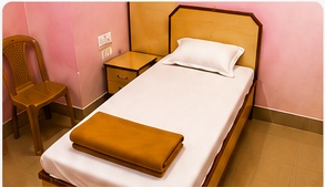 Single room at Karawali Deluxe Lodge
